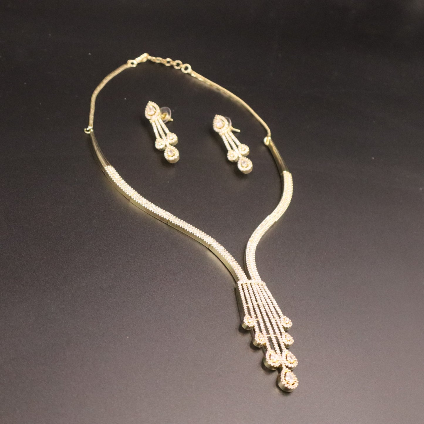 Golden Dhwani American Diamond Hasli Necklace set