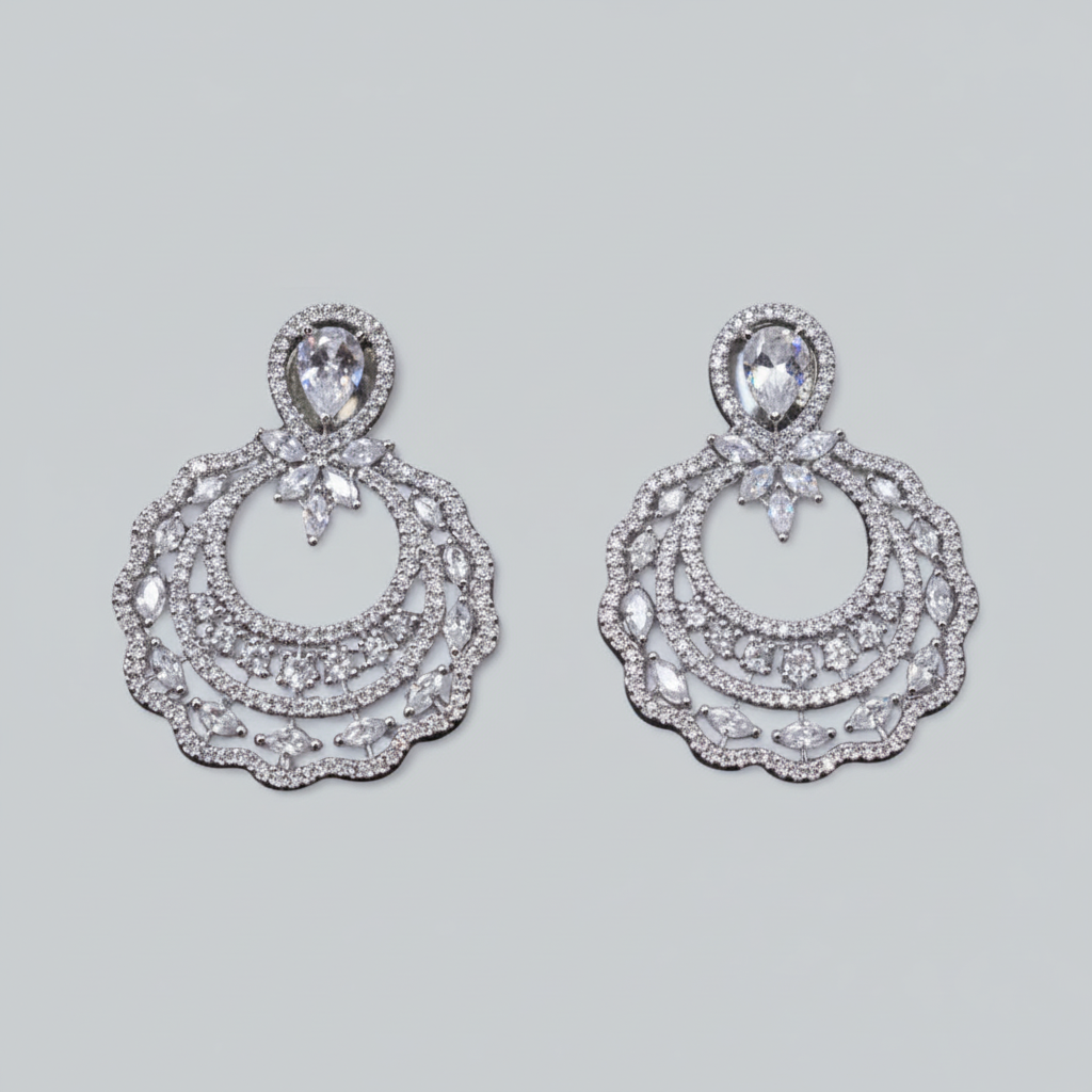 Silvery Prerana American Diamond Danglers